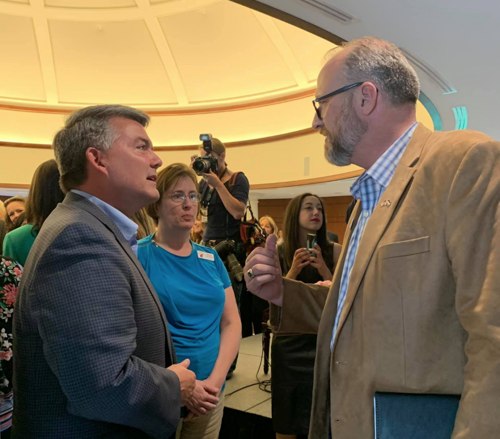 Republican candidates Sen. Cory Gardner and Corey Seulean chat at an invite-only campaign event featuring former UN Ambassador Nikki Haley